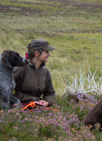 Luise on the moor with the pointers